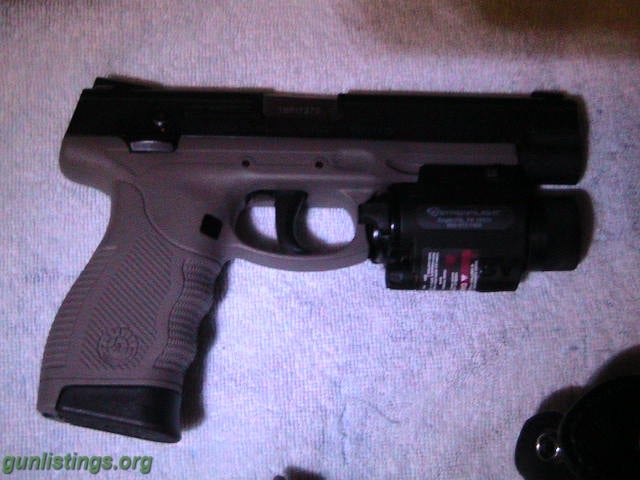 Pistols Taurus 9mm  24/7  With Laser