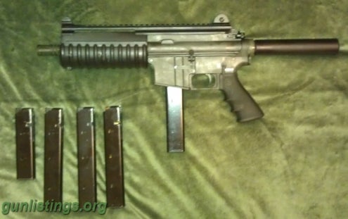 Pistols Bushmaster 9mm AR Pistol With Extras.