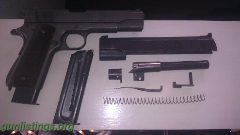 Pistols WWII M1911A1 .45cal W/ .22cal Conversion Kit