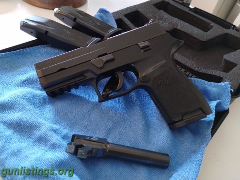 Pistols SiG P250 .40 Cal With An Extra . 357 SiG Barrel