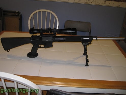 Rifles Bushmaster Varmint Rifle, Bull Barrel SS AR-15 223 AR1