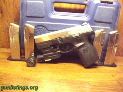 Pistols S&W Sigma 9MM 4mags/Green Laser