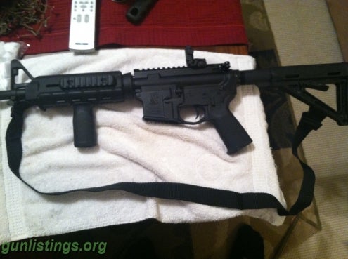 Rifles Bushmaster M4 MOE Magpul