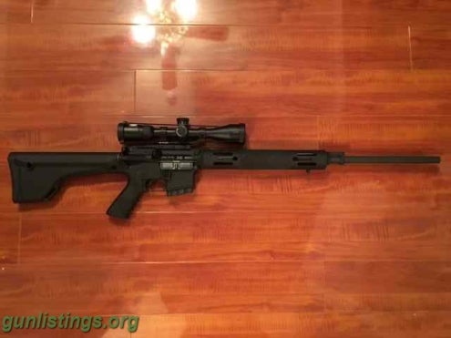 Rifles Bushmaster Varminter AR-15 .223 5.56 & Nikon P-223