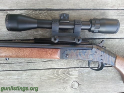 Rifles NEF Hunstman 50 Cal Muzzleloader & Scope