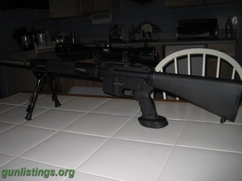 Rifles Bushmaster Varmint Rifle, Bull Barrel SS AR-15 223 AR1