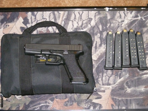 1st Gen. Glock 22 with Trijicon sights and extras in springfield ...