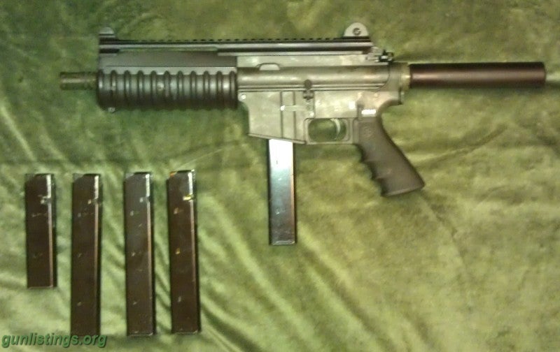 Pistols Bushmaster 9mm AR Pistol With Extras.