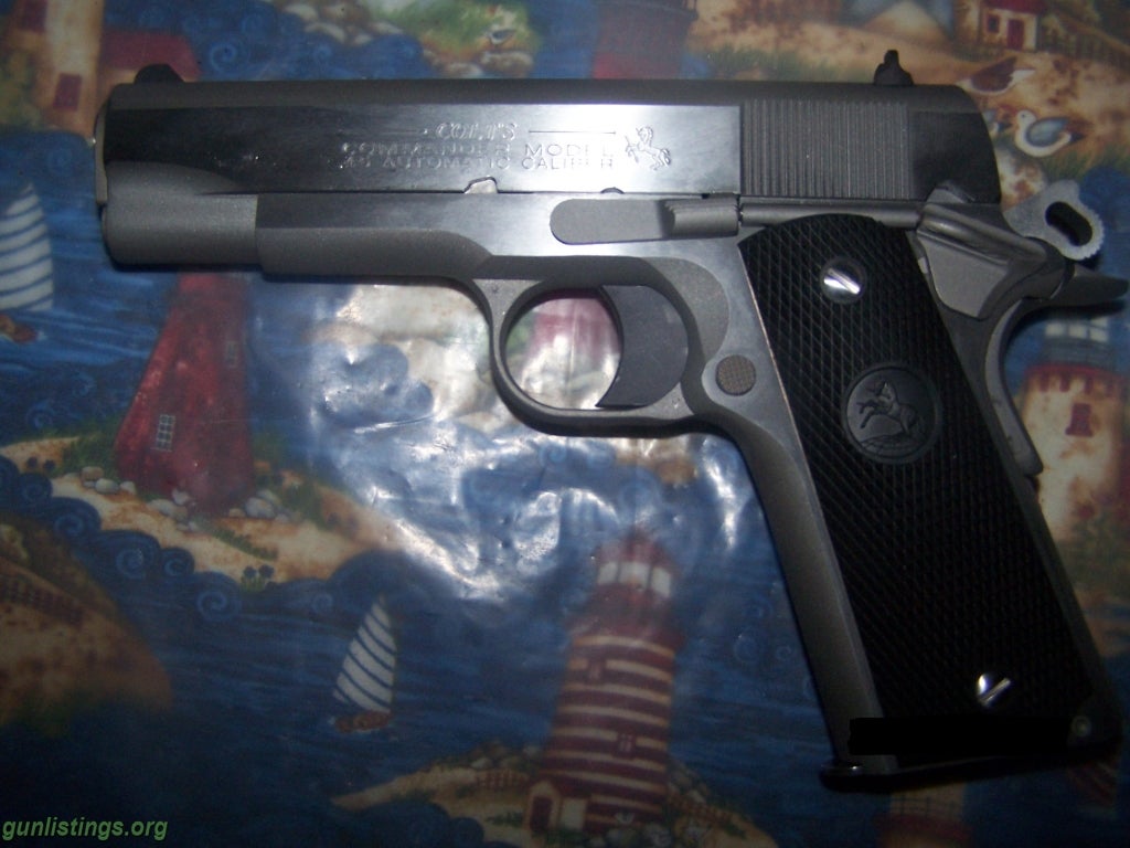 Pistols Colt Commander 45 Auto.