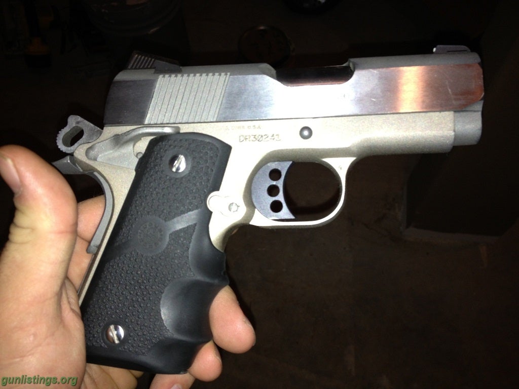 Pistols Colt Defender 1911