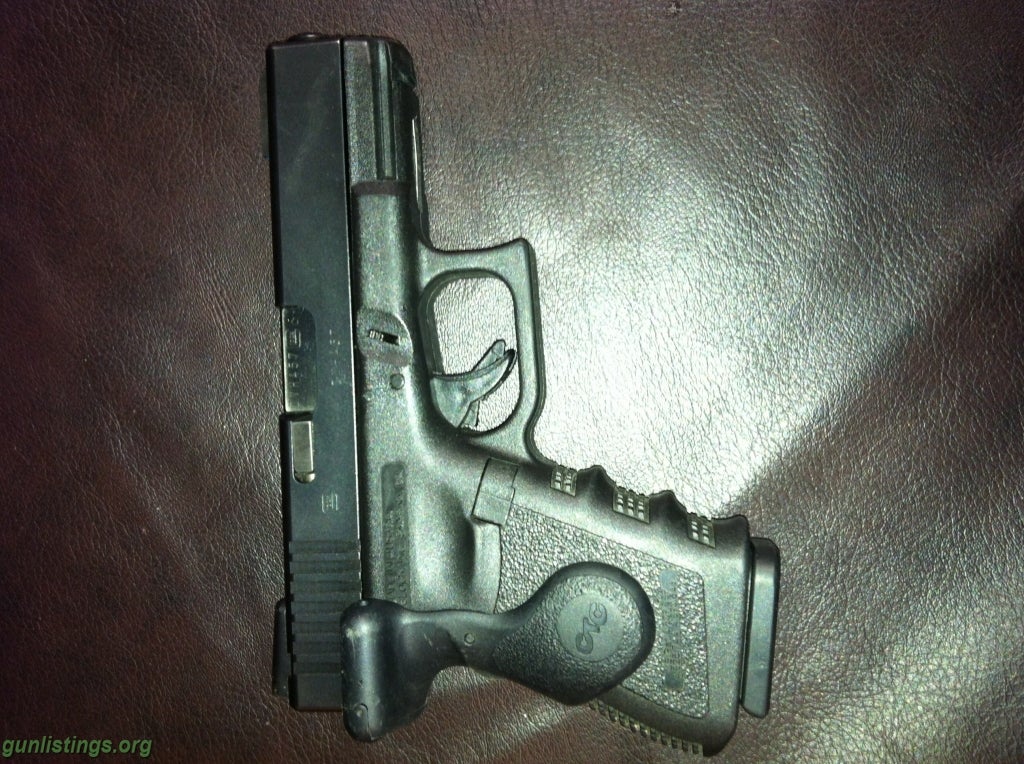 Pistols Glock 23 With Crimson Trace Laser Grip