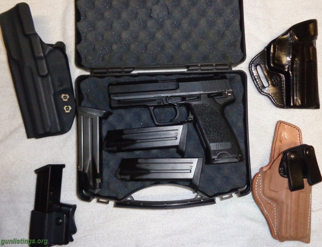 Pistols HK .45 USP. W/ 5-12rnd Mags, 3 Holsters, Ammo.