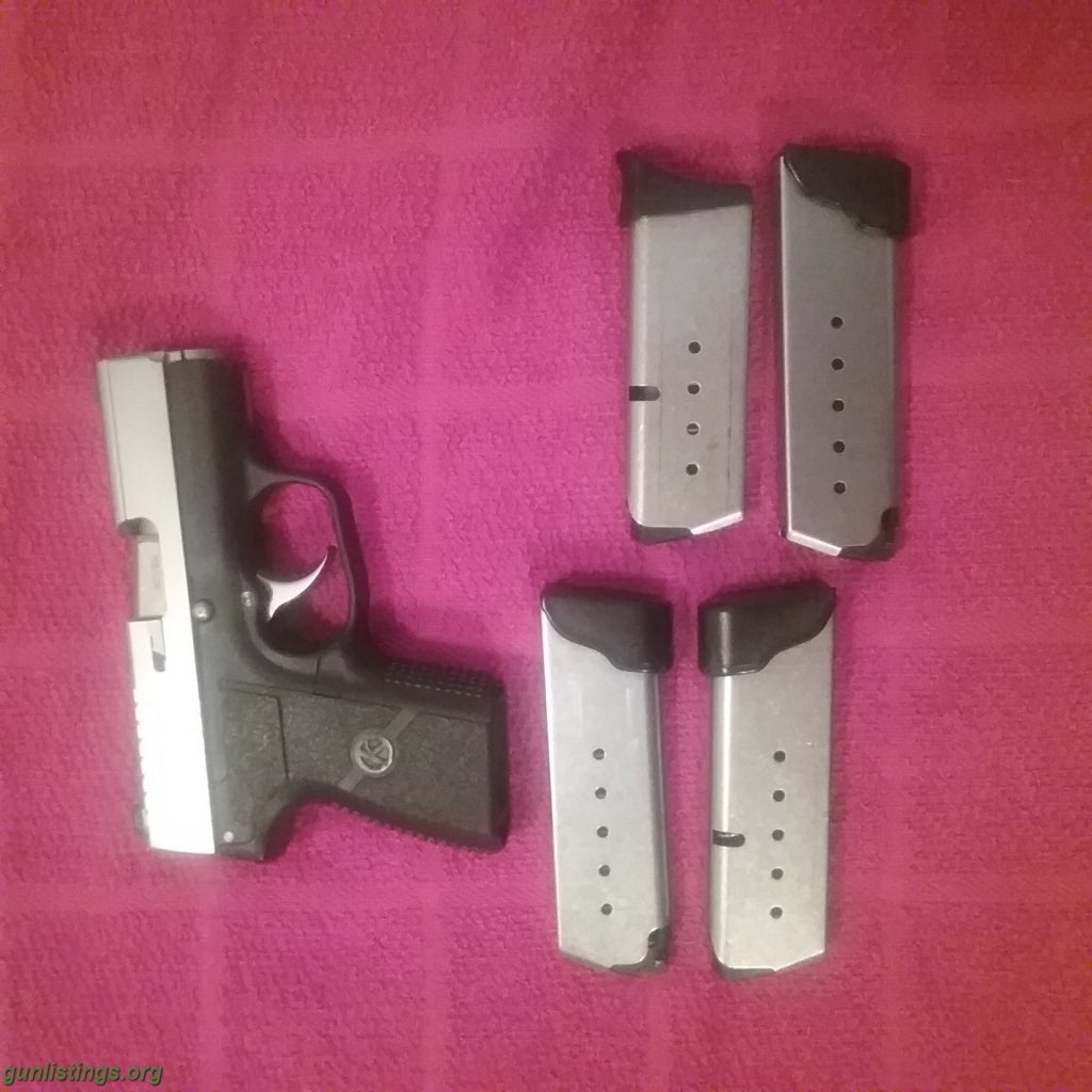 Pistols KAHR PM 40. 4 Mags. Trijicon Nite Sites