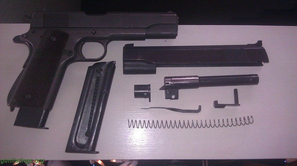 Pistols WWII M1911A1 .45cal W/ .22cal Conversion Kit