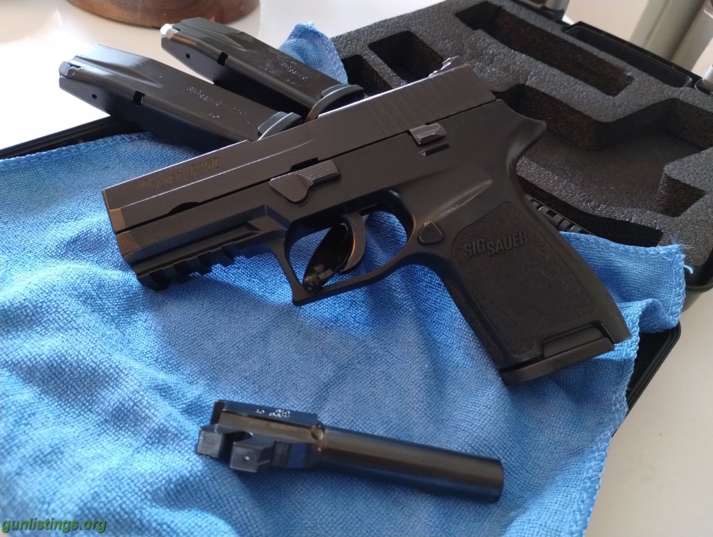 Pistols SiG P250 .40 Cal With An Extra . 357 SiG Barrel