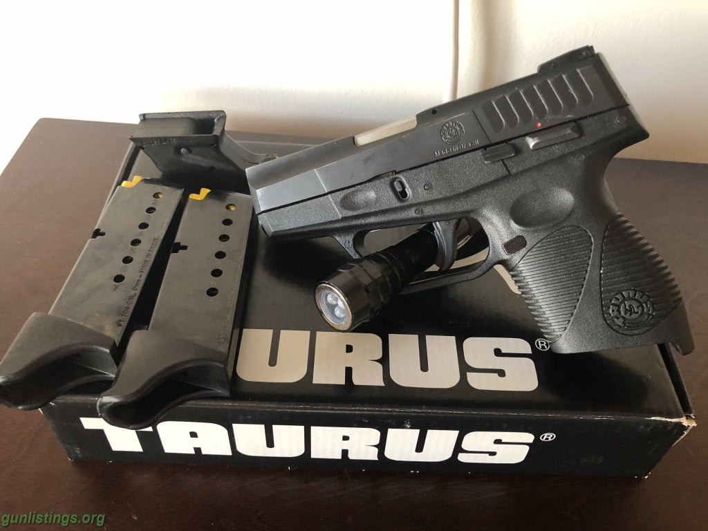 Pistols Taurus PT 709 Slim W/Laser