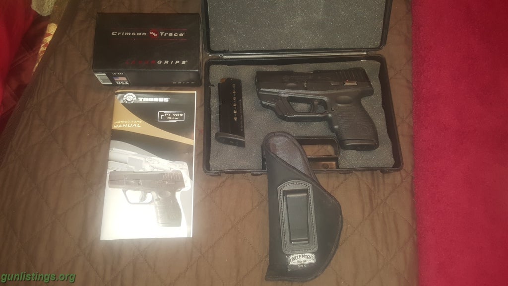 Pistols Taurus PT 709 With Crimson Trace Laser