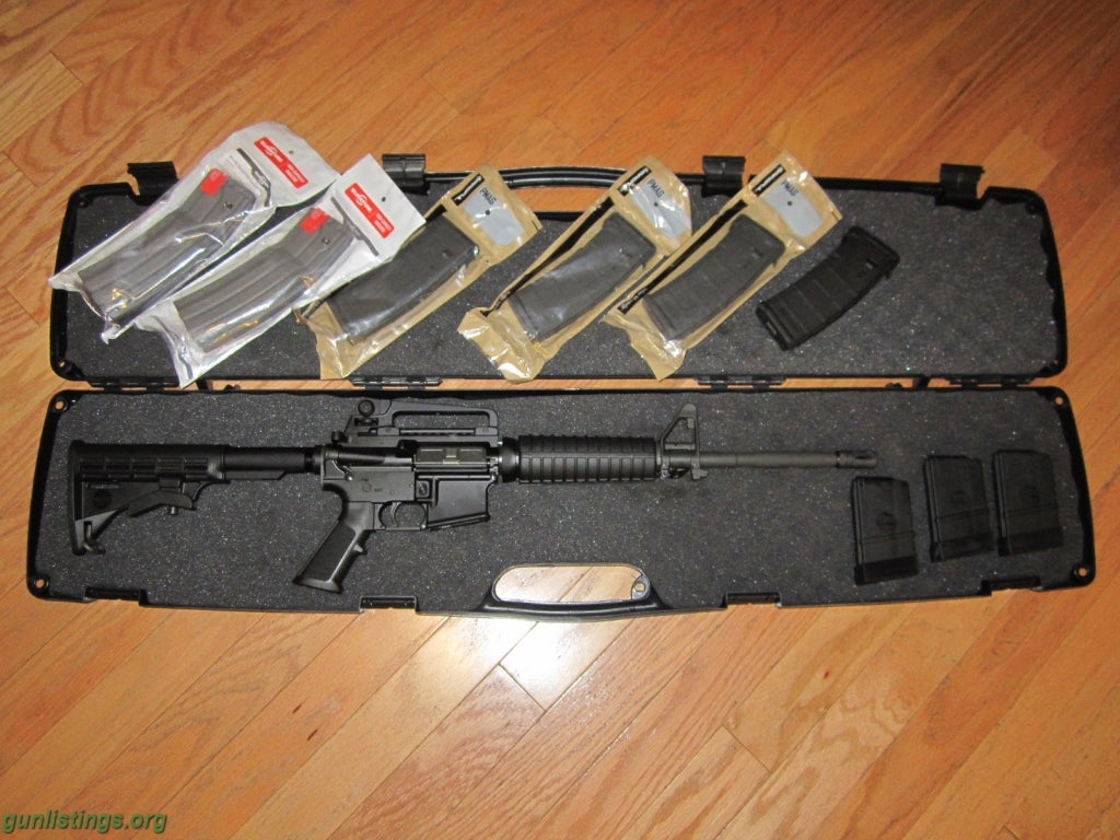 Rifles Bushmaster AR-15 .223 (Never Fired)