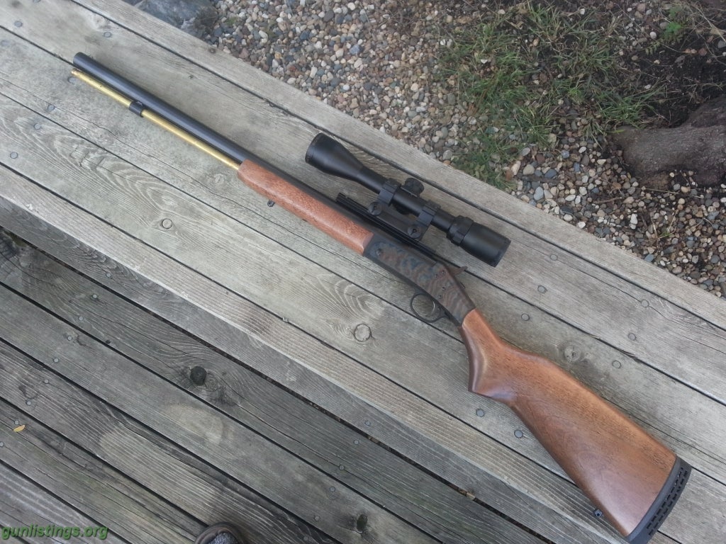 Rifles NEF Hunstman 50 Cal Muzzleloader & Scope