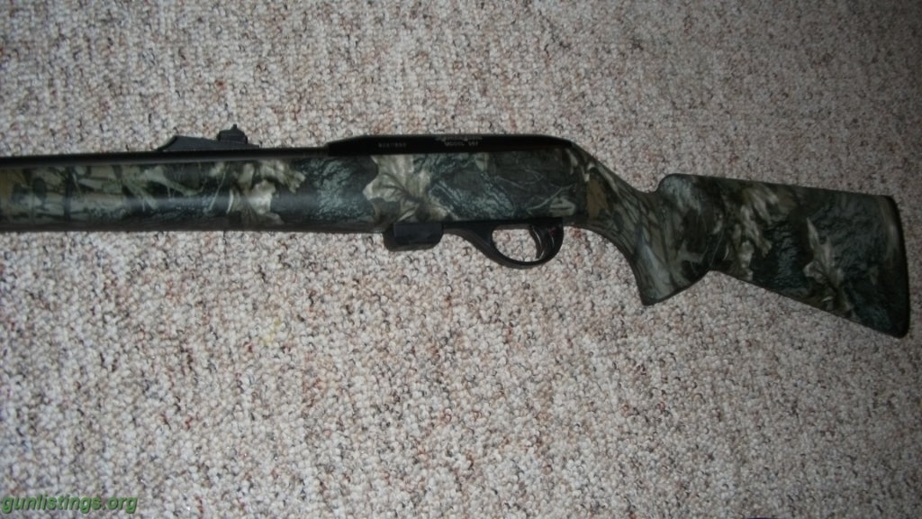 Rifles Remington 597 22 Semi Auto Rifle Camo Stock Blue Barrel