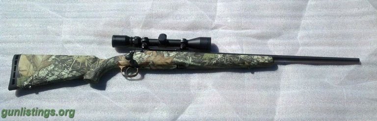 Rifles Savage AXIS XP .223 Camo W/ 3x9x40 Bushnell Scope