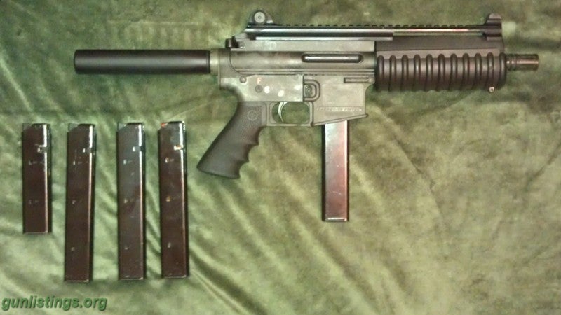 Pistols Bushmaster 9mm AR Pistol With Extras.