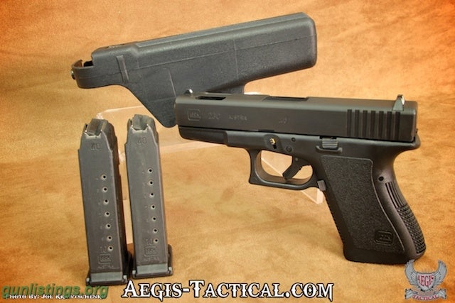 Pistols GLOCK 23C 40S&W LASERMAX COMPENSATED PORTED USED