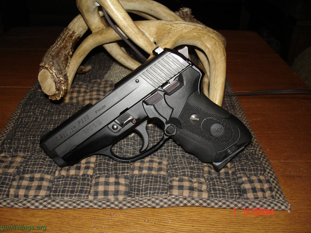 Pistols SIG P239 WITH CRIMSON TRACE GRIPS