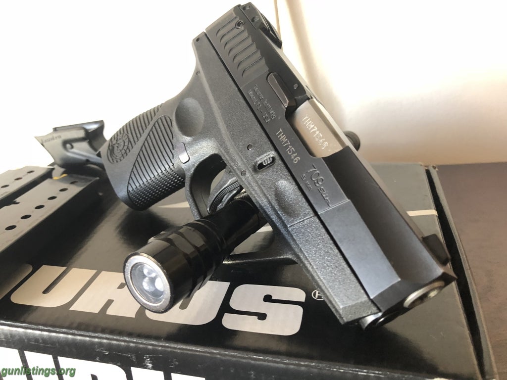 Pistols Taurus PT 709 Slim W/Laser