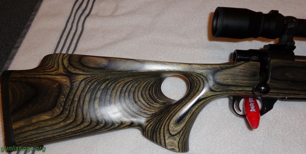 Rifles 22-250 Heavy Barrel Varmint, Thumbhole Vented Stock.