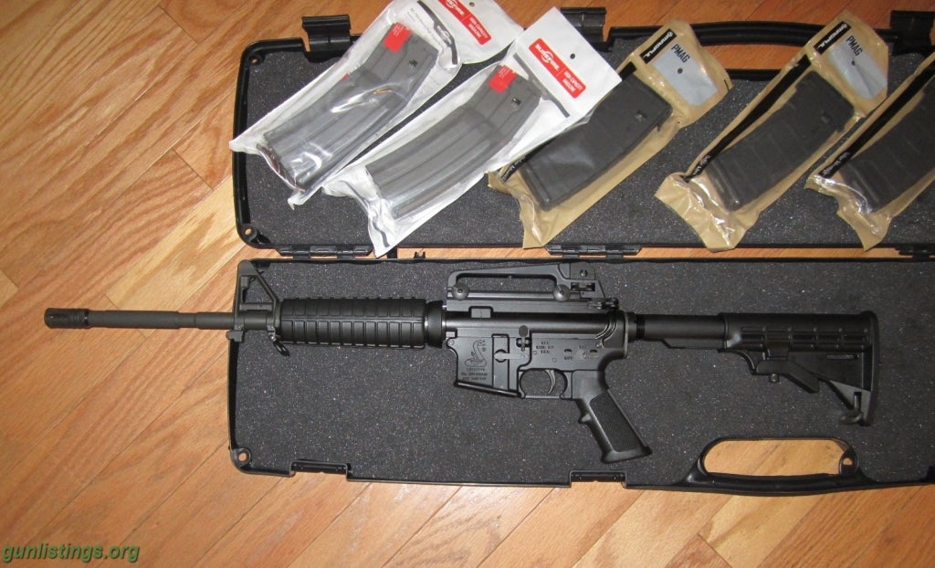 Rifles Bushmaster AR-15 .223 (Never Fired)