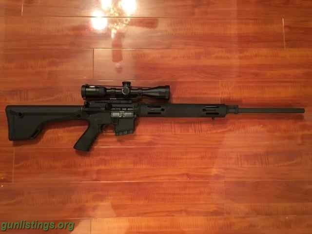 Rifles Bushmaster Varminter AR-15 .223 5.56 & Nikon P-223