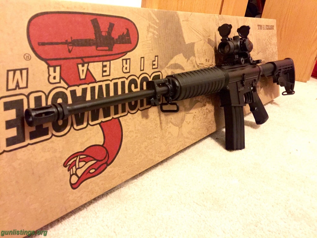 Rifles NIB Bushmaster AR-15 W/ Red Dot