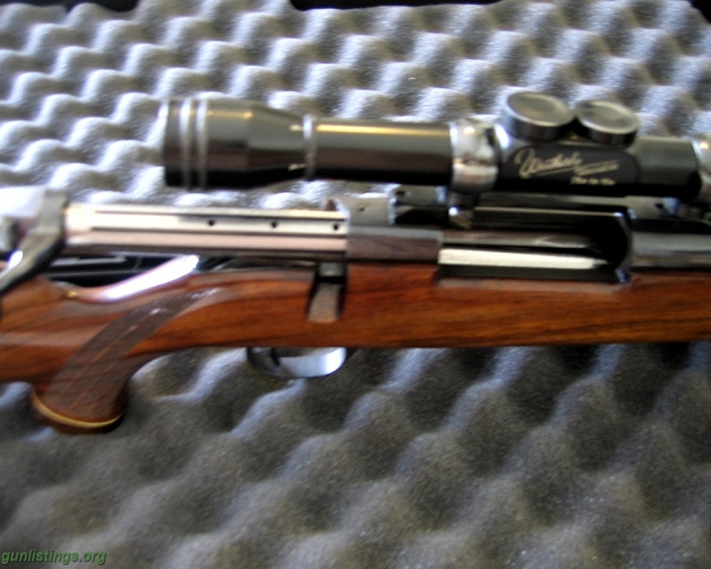 Gunlistings.org - Rifles WEATHERBY 300 MAG MARK V WITH SCOPE