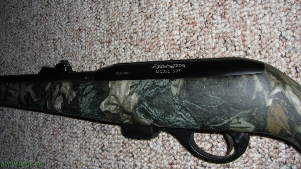 Rifles Remington 597 22 Semi Auto Rifle Camo Stock Blue Barrel